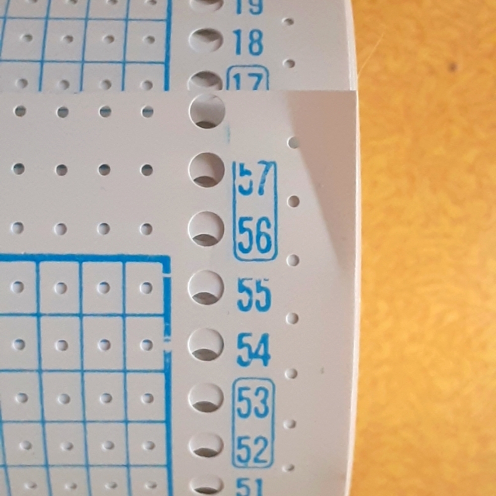 Flatbed knitting machine punch pattern roll